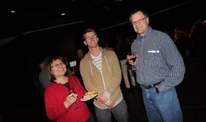 Jim Tanner (right) along with his wife Dianne Tanner (left0 and BFA alumnus Kyle Miller (centre) at Jim's retirement party in December of 2013.